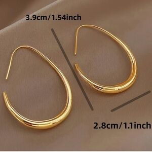 ANTHRO 18k gold plated oval drop earrings; nwot
